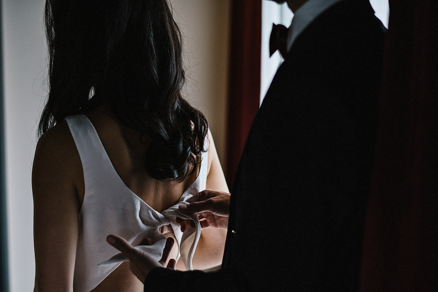 21-525-Best-Wedding-Photography-Toronto-Ontario-Canada-Photojournalistic-Genuine-Candid-Moments-Groom-Helping-Bride-Get-dressed.jpg