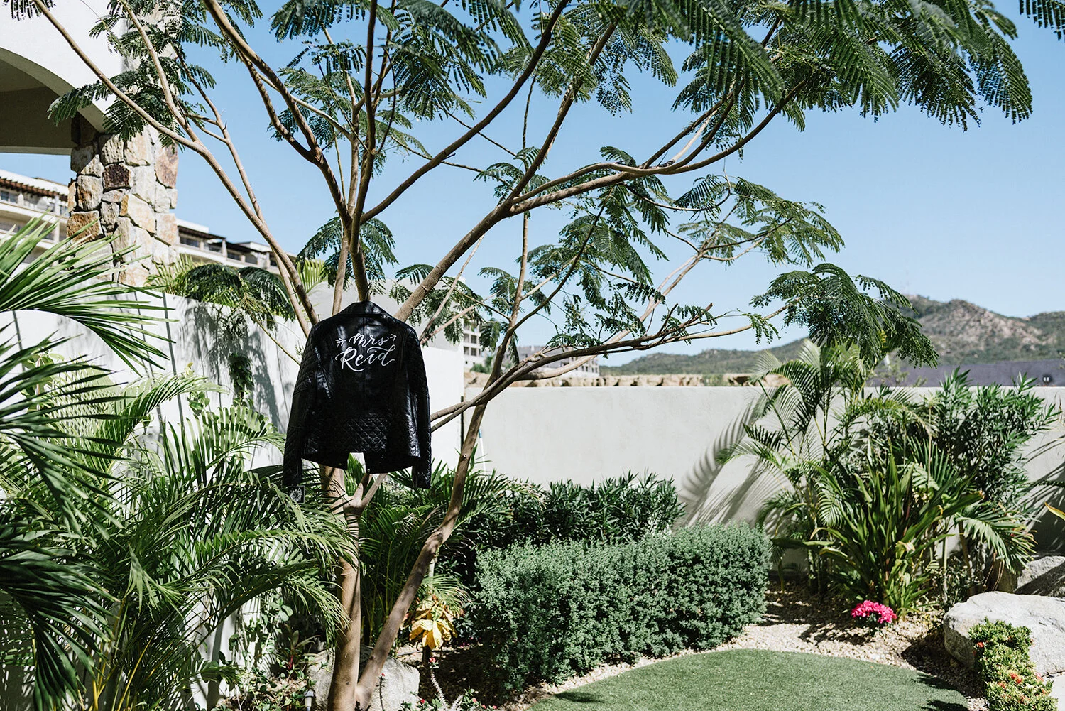 366-destination-wedding-cabo-san-lucas-ventanas-private-residence-alternative-toronto-wedding-photographer-details-palm-trees-getting-ready-just-married-jacket-details-leather-mrs-jacket.JPG