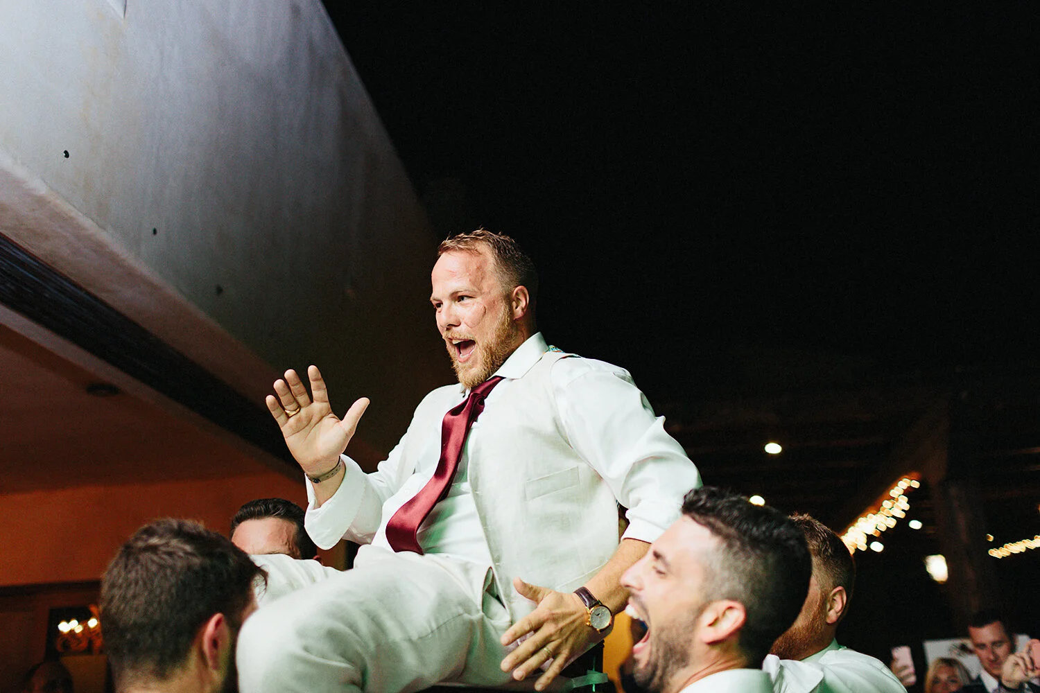 472-cabo-san-lucas-junebug-weddings-green-wedding-shoes-toronto-wedding-photographer-3b-photography-ventanas-private-club-mexico-reception-night-real-moments-party-dancing-good-times-groom-partying-chair-hilarious.JPG