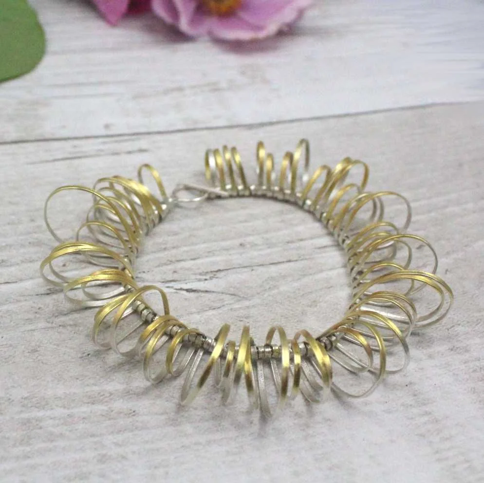 silver and gold plated loop bracelet