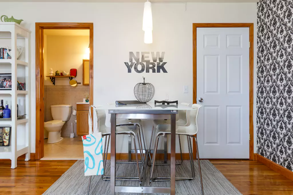 03 Dining table with extra stools available.png