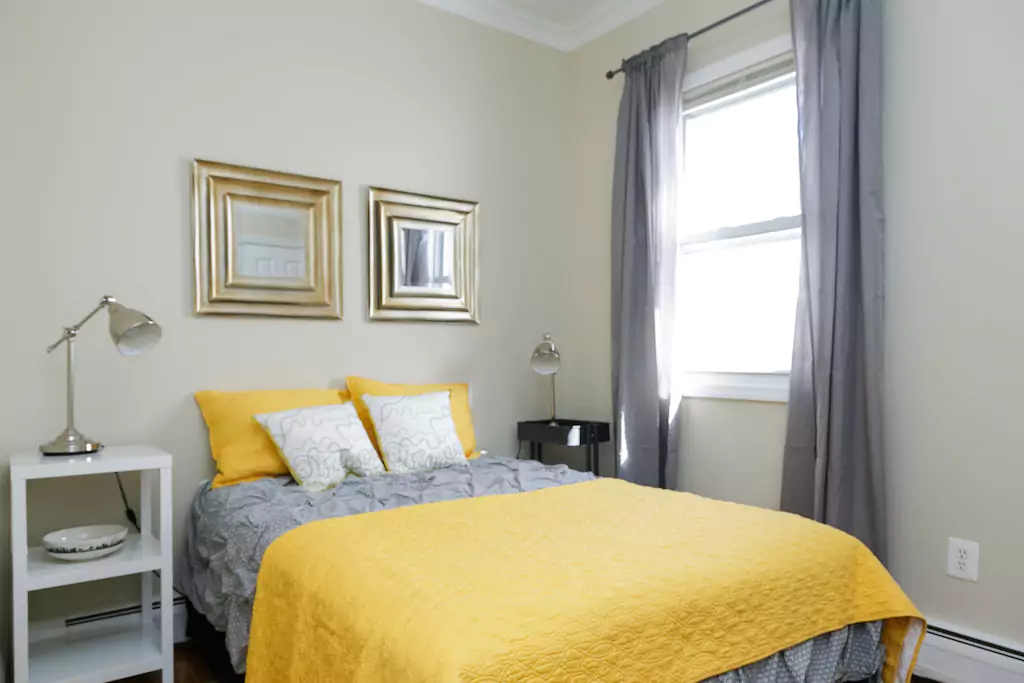 15 Bedroom with east facing windows.png