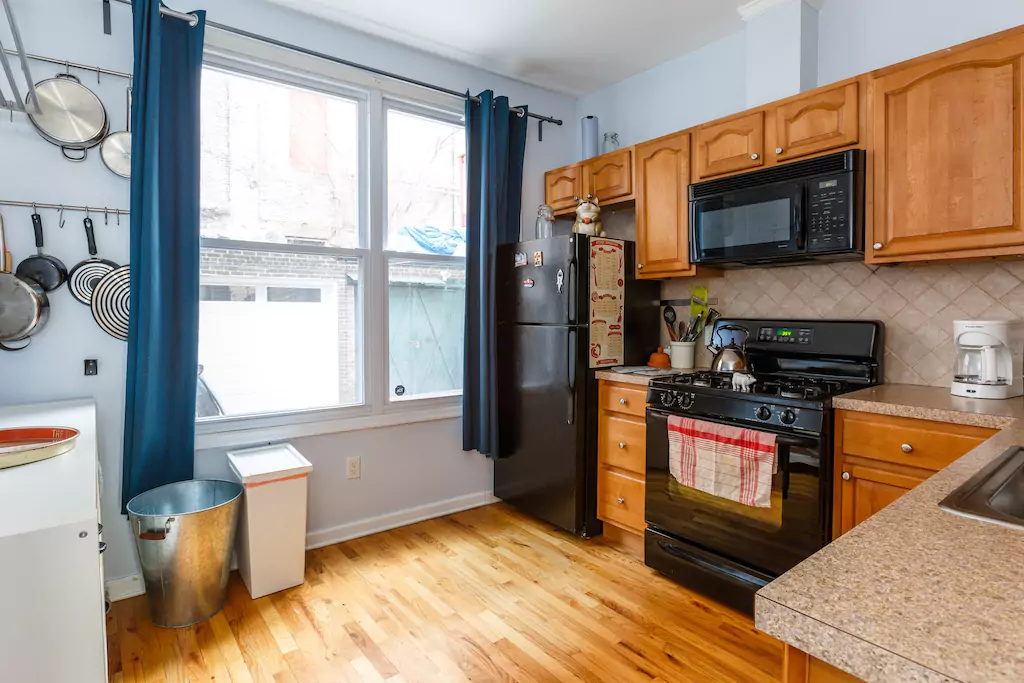 18 Kitchen faces the back of the house.png