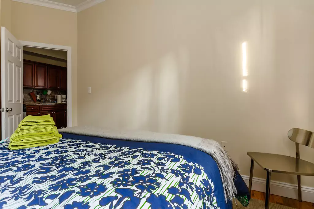 06 Bedroom opens to kitchen.png