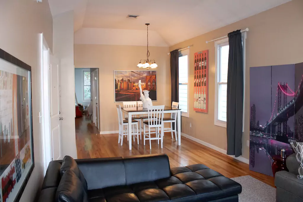 03 Large sunny 2nd floor apartment. Open living room dining room.png
