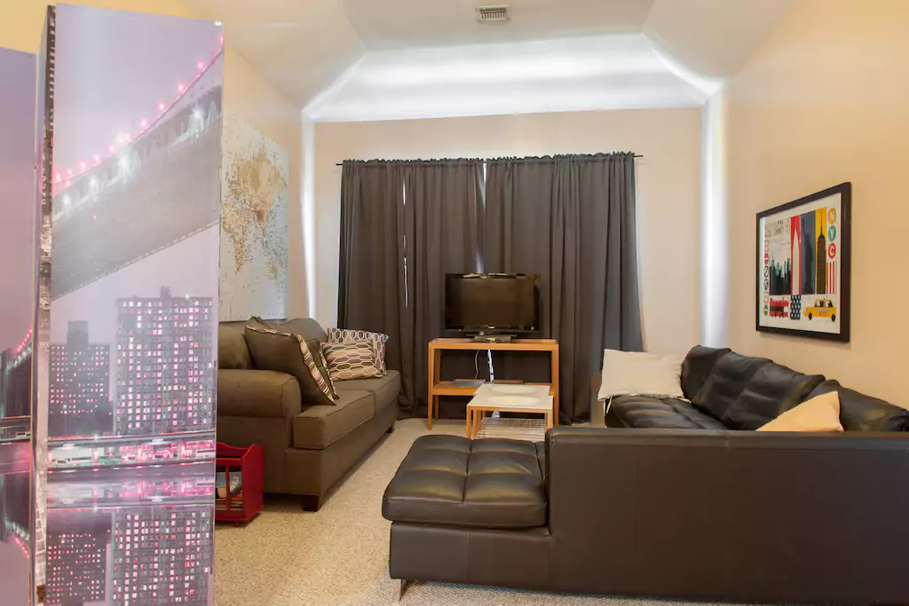 09 Large living area with pull out sofa for extra sleeping spots.png