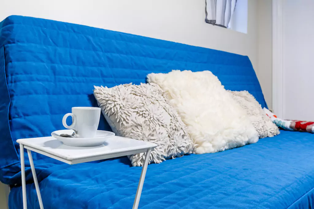 08 Futon in living area.png
