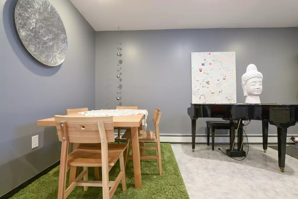 03 Dining table for four with extra chairs available.png