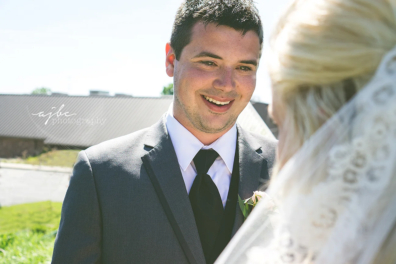 first look bride and groom photos.jpg