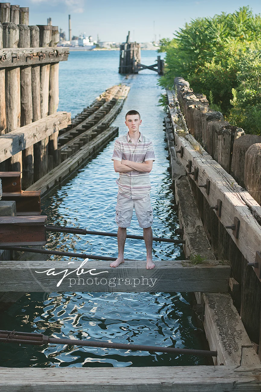 outdoor senior boy photoshoot on the water.jpg