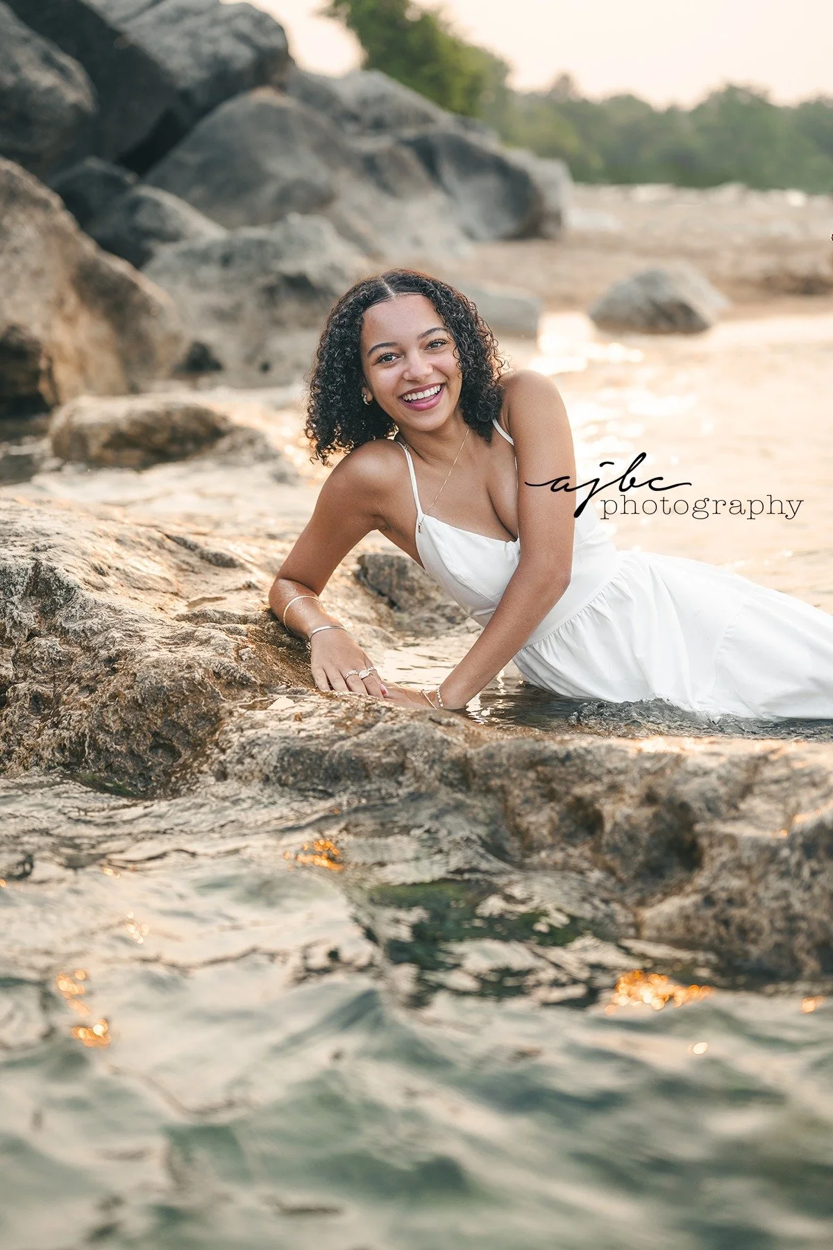 Lily traveled from Grand Rapids, on the opposite side of the state, to come do a session with me here, specifically asking for our rocky beaches - so I delivered. 

She showed up looking like a goddess, and after that, things just kept aligning perfe
