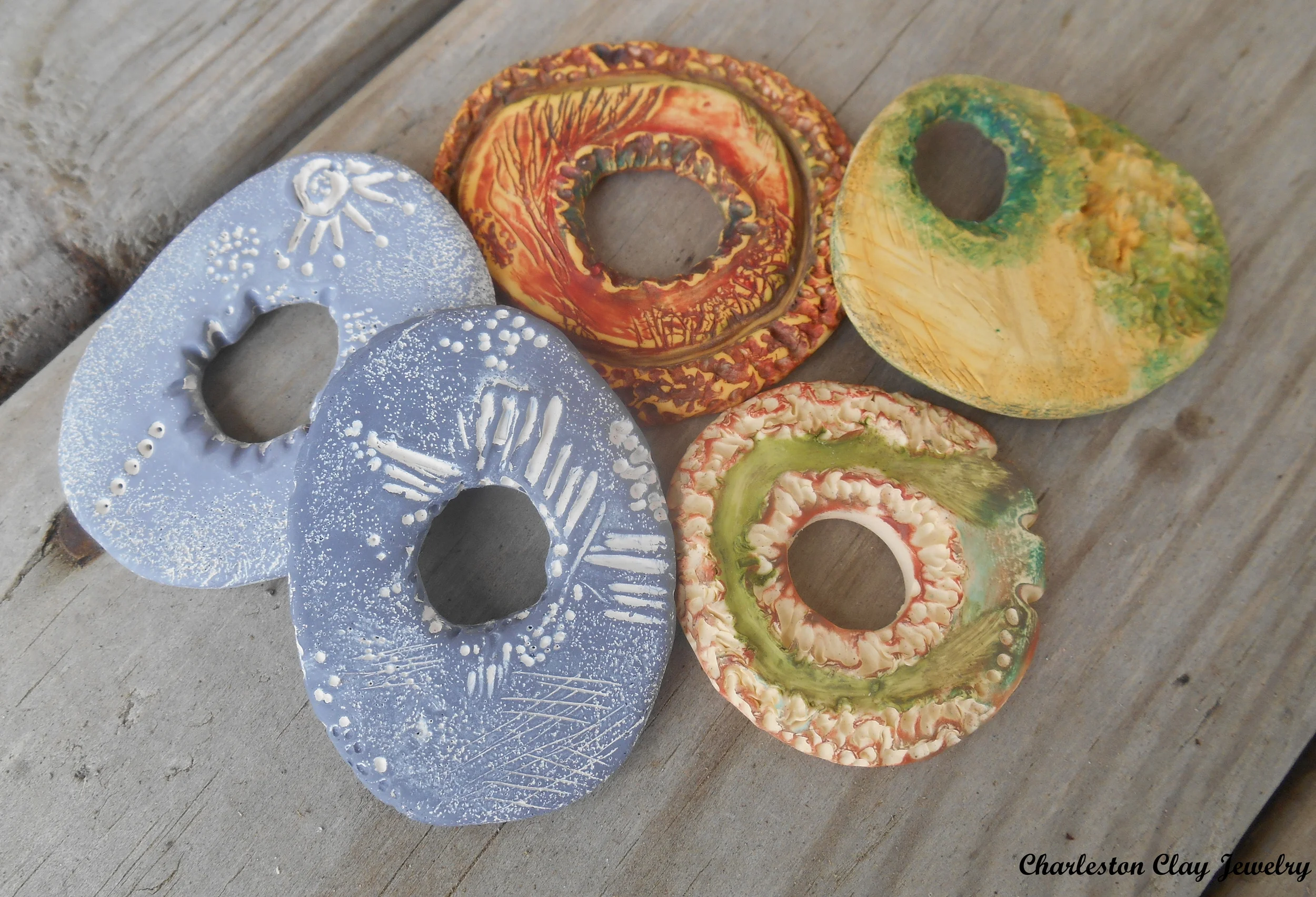 I have been having a lot of fun the past few days! I really enjoy pushing my limits with the clay, and have discovered a love for creating organic shapes, textures, and colors! Here is a little sneak peek for you! I came up with this great new texture technique that I like to call "Ruffling." You can see it on this textured bead very clearly: