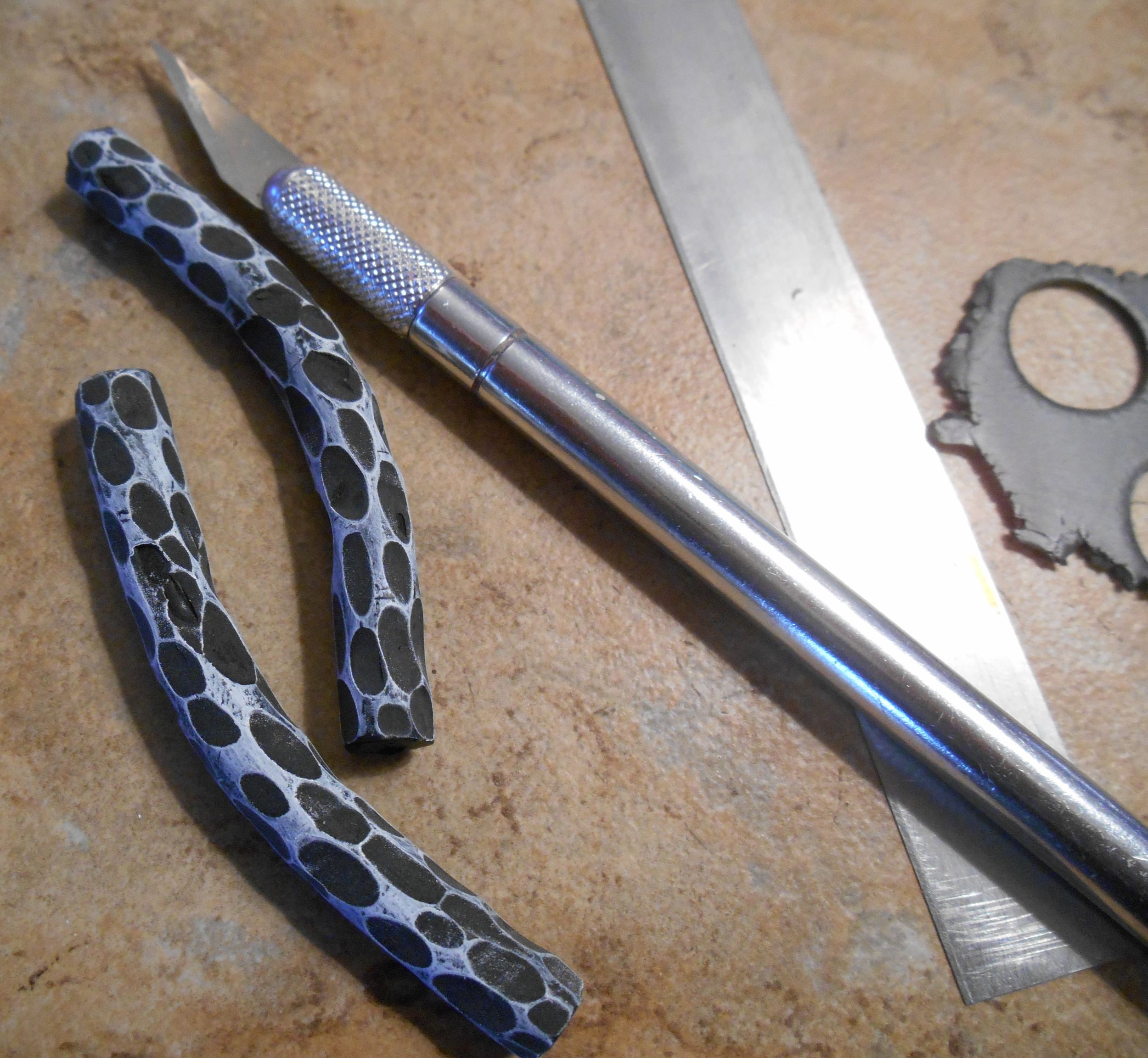 I thought a little carving on the tube beads would add some interest! Then I went over them with gilders paste to really showcase the texture. 