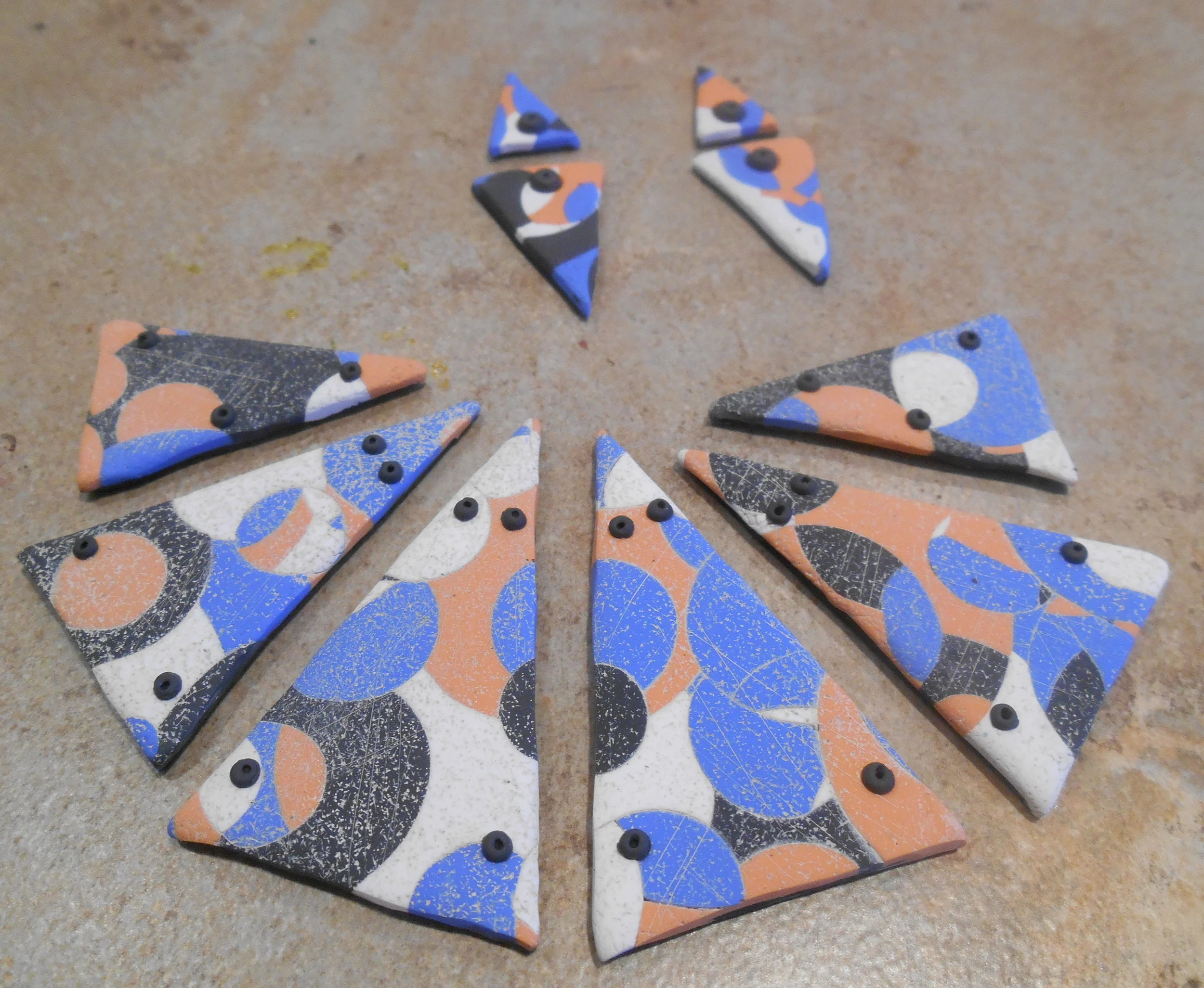Woohoo! Now we are getting somewhere! I gave these a pop of creamy white to showcase the textures. I also added some interest with little pearls on each bead- you can see the earrings now too!