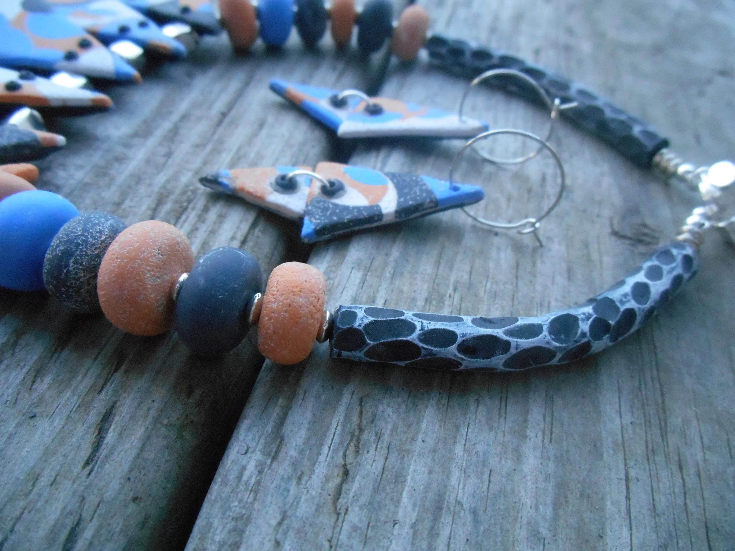 An up close of the little textured beads and the hand carved tube beads. Such a fun wearable art set. I hope you enjoyed watching me build the bones of my design! Perhaps it sparked a new passion in you!