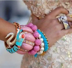 Great stacking trends going on right now! Love the colors on these-though I'm not usually into pastels. It looks like we are stacking all kinds of styles and metals with no looking back! Source: www.fabfashionfix.com