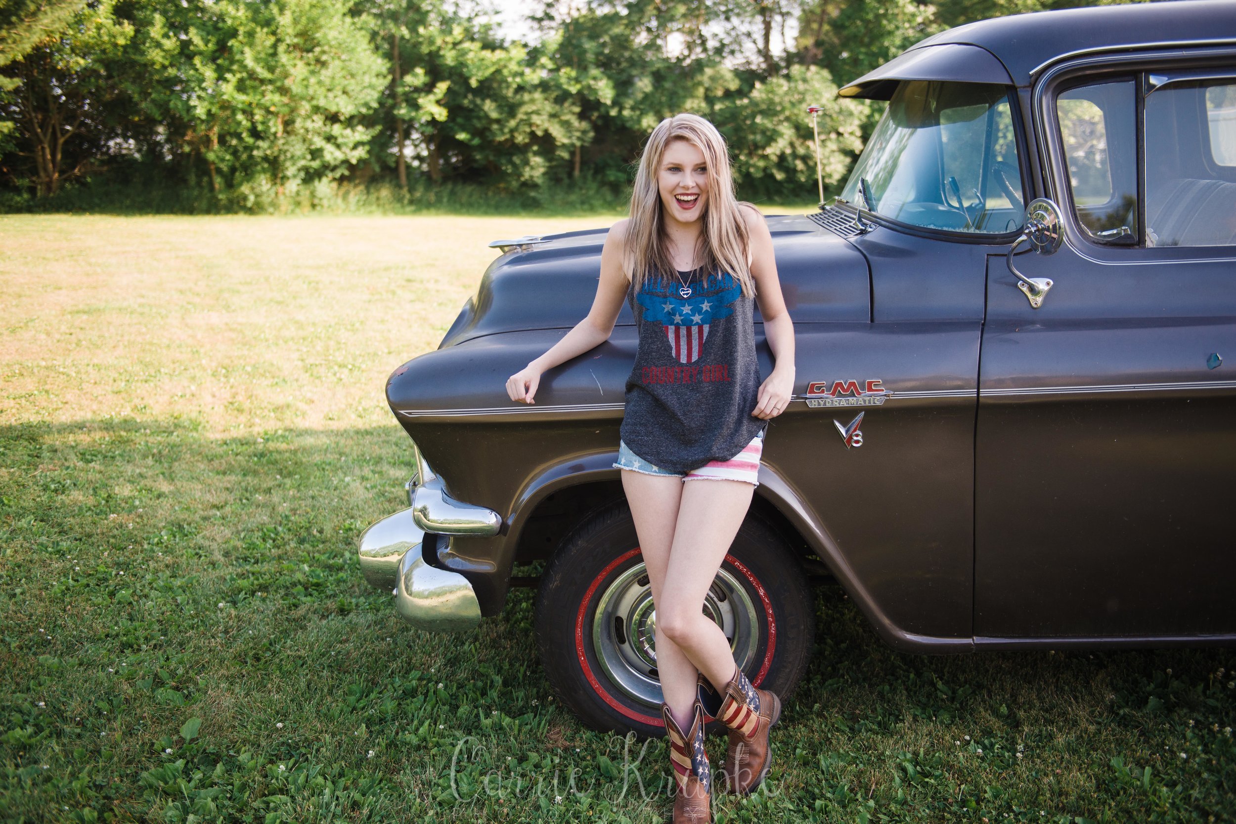 Natalie loves vintage trucks and after a few phone calls, I was able to secure a gentleman near our shooting locations that we could pick from three trucks he had at his farm and was willing to park them in his field for us to use!!