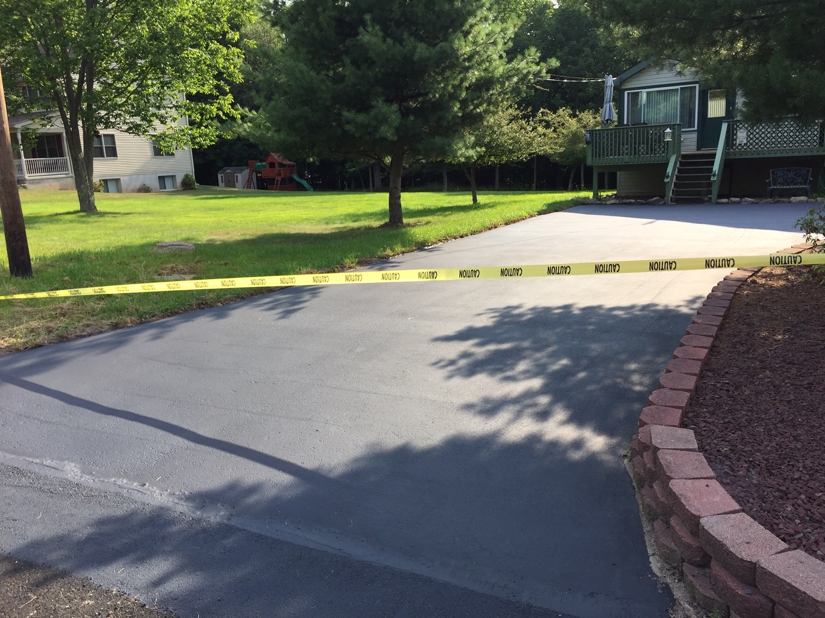 Coal Tar Based, Hand Applied Seal Coat.