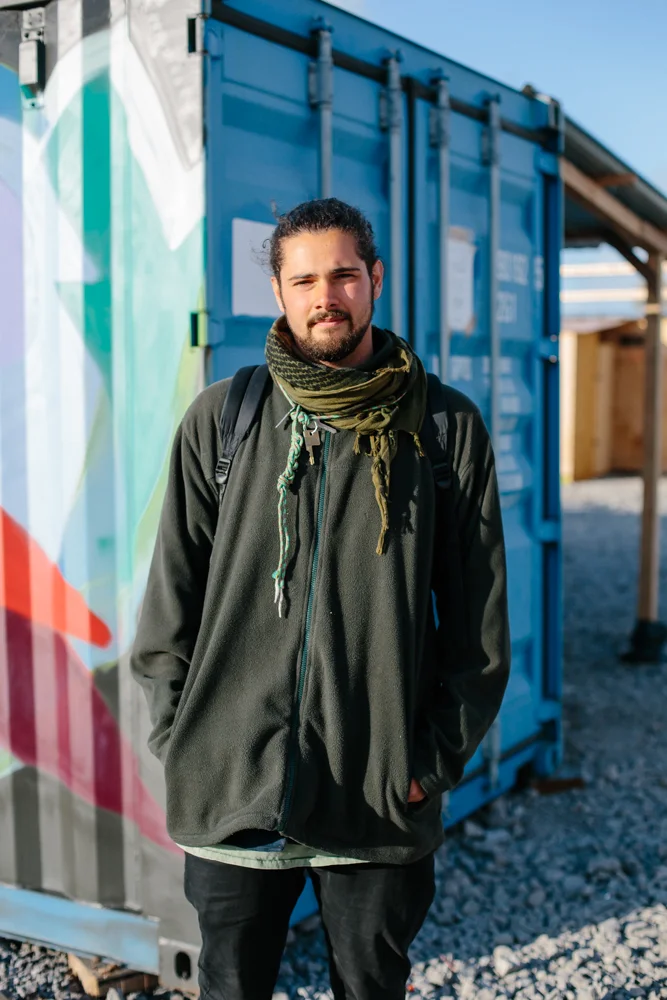 William, 24, Has been running the men's clothing distribution at the Dunkirk camp for 7 weeks since it opened. Is living at a local hotel with girlfriend Mimi who is running the play school