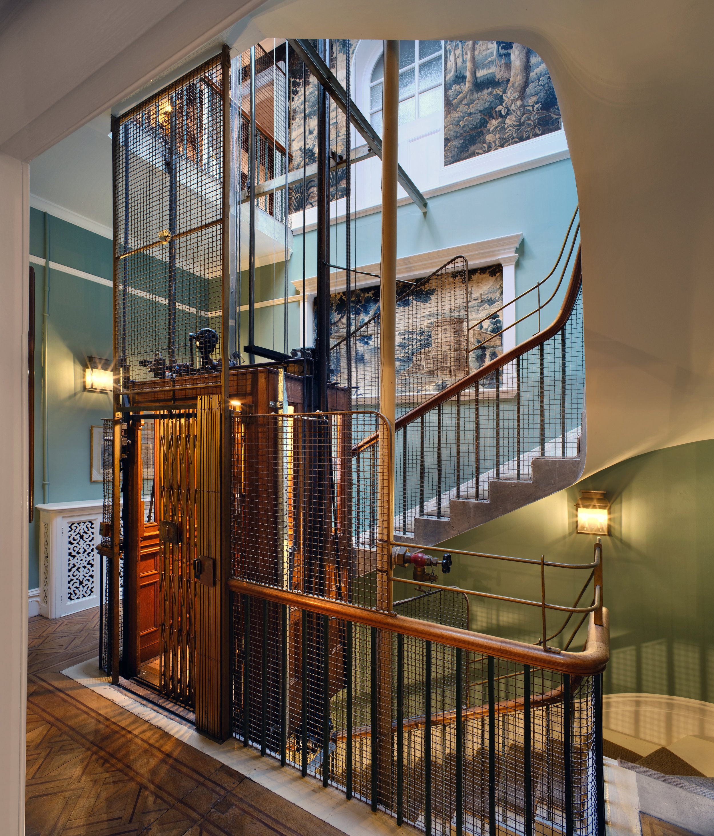 The main staircase and lift entrance to the apartment