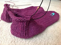 Turning the 2 at a Time Toe Up Heels on her very first pair of socks!