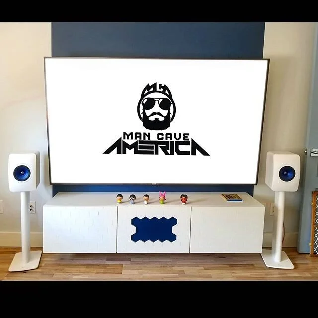 80" @sony TV with @kef_audio 7.1 surround. Custom floating media console housing center channel behind matching blue speaker cloth. We are always up for new creative ways to personalize a #mancave ! #mancaveamerica #custominstall #sony #kef #av 