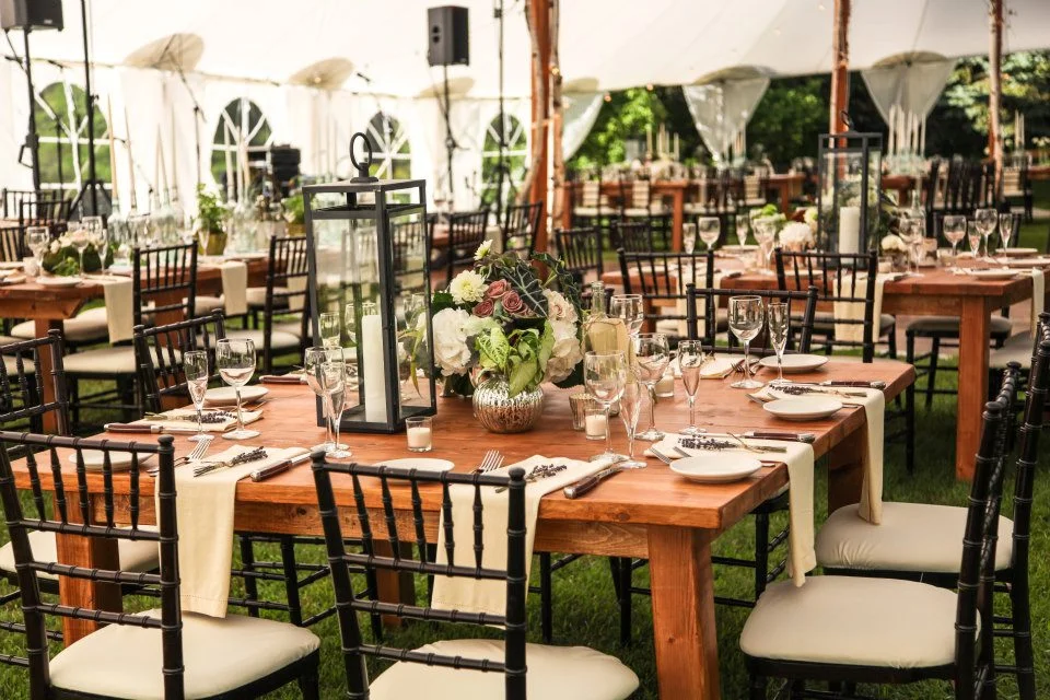 Tented wedding on the grounds at Jesse's