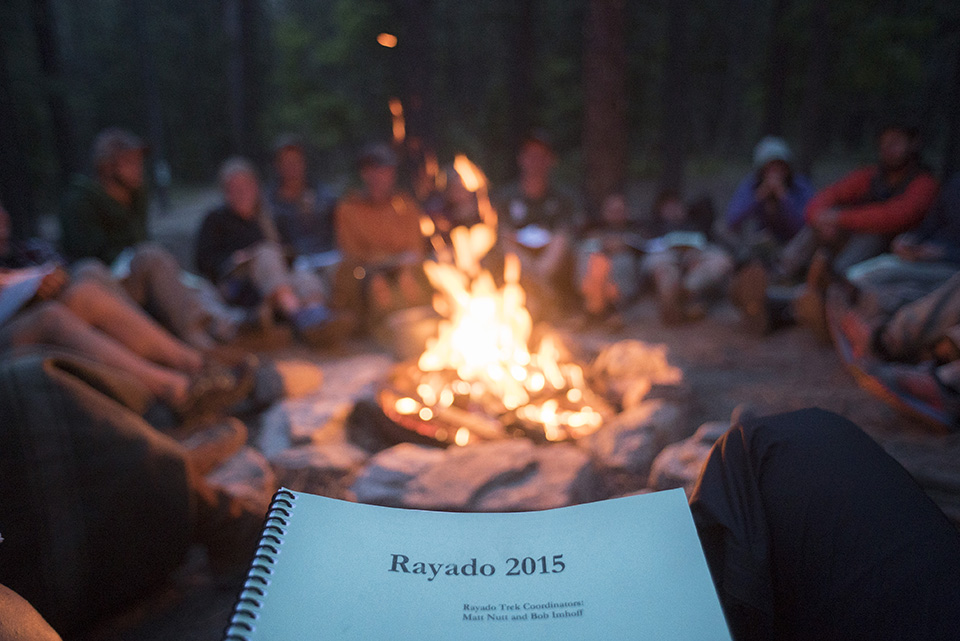 Rayado rangers gather around a campfire during Rayado training.