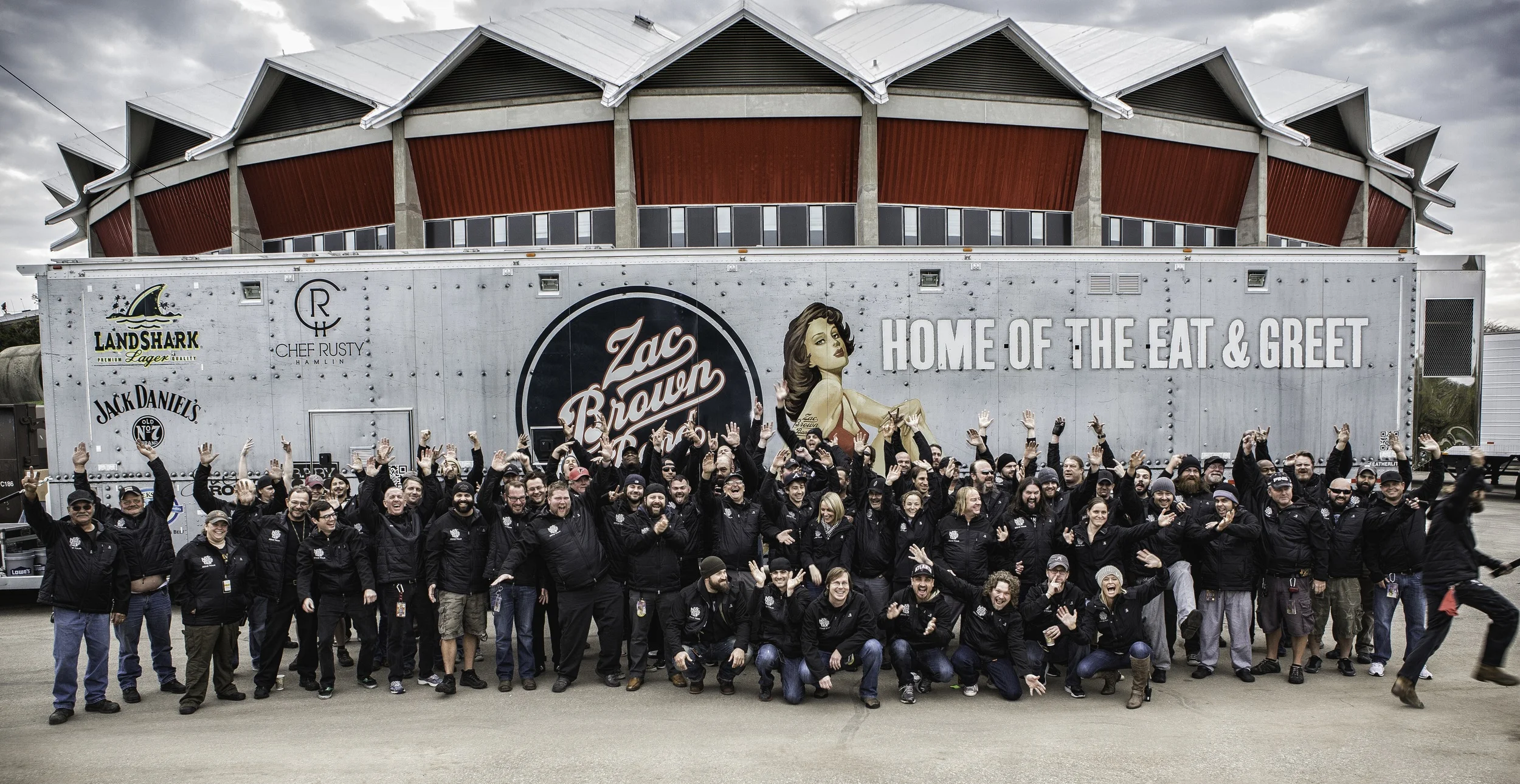 Home Is Where The Crew Is When photographing large groups, I always try and make it short and sweet (and usually on top of a ladder). After I get the standard shot and have what I need, I always yell, "Ok, one more, but this time, go crazy!!" It worked this time.