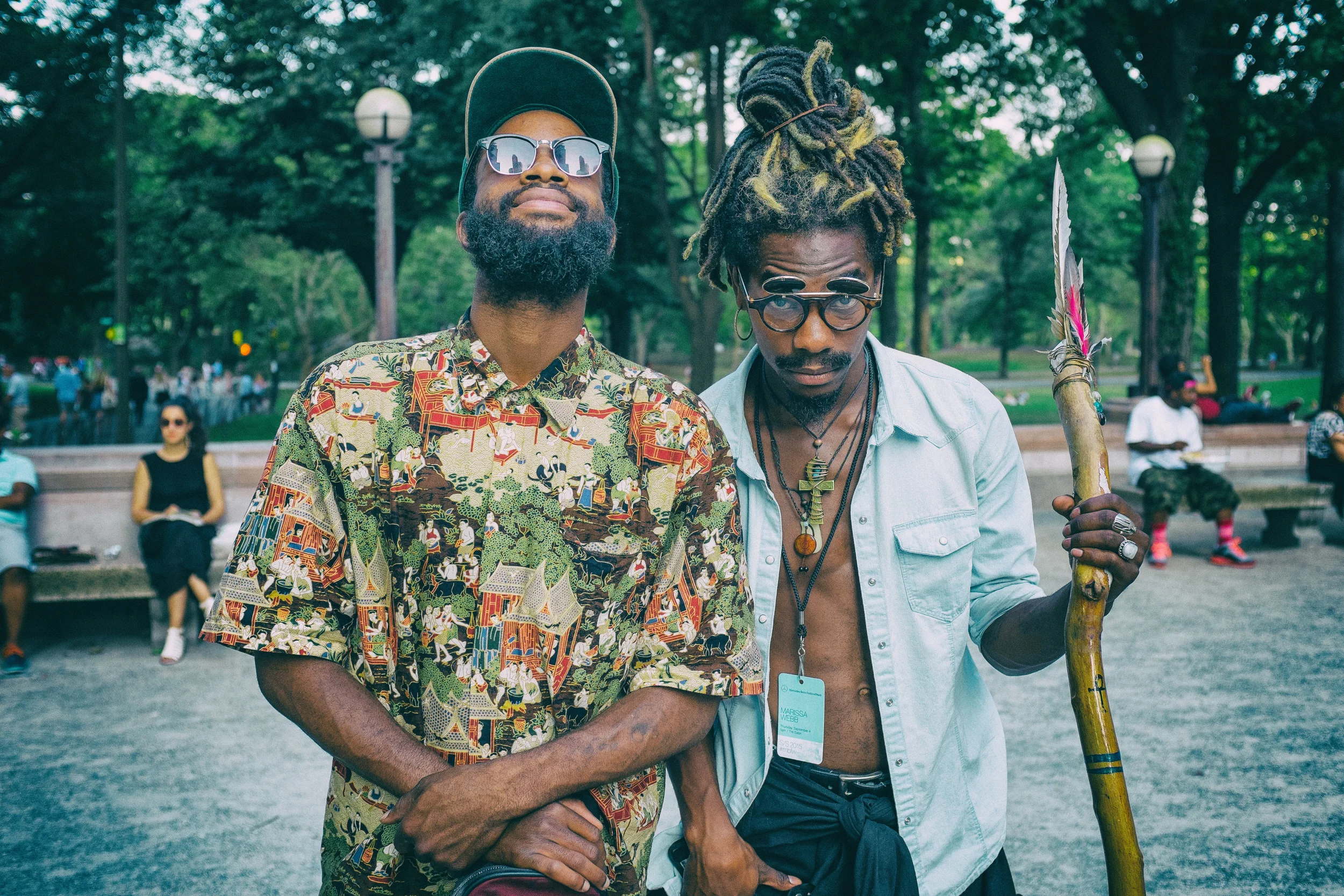 While waiting for the van to arrive after shooting for the day in Central Park, I noticed these two guys playing music and couldn't help but as for a picture. They obliged, in epic fashion. I love the buildings reflecting in the sunglasses and the other countering by looking down. Can you tell they were there for fashion week?