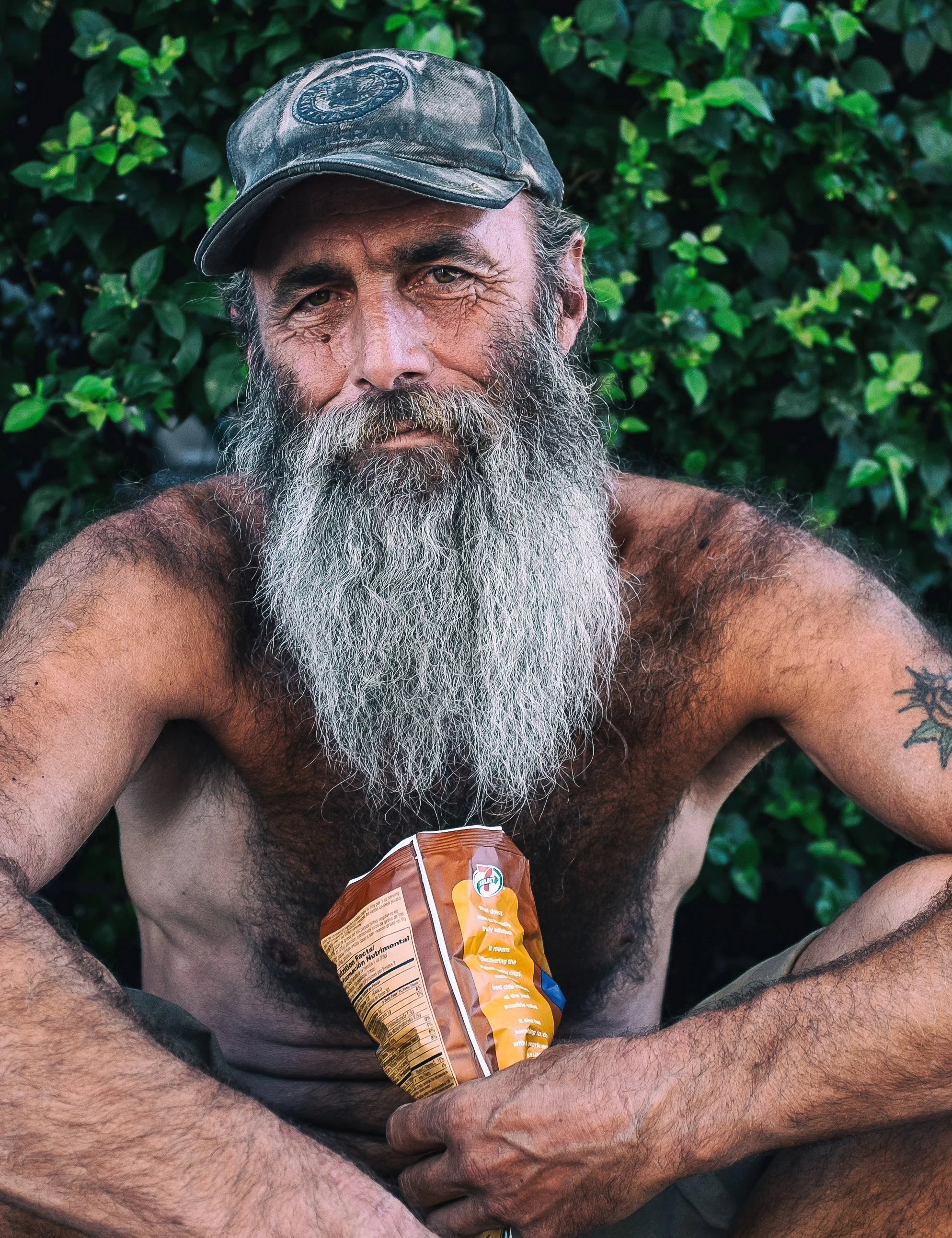 As a cinematographer, I tend to always shoot horizontally. Part habit and part rebellion against vertical iphone videos, this shot of a man on the streets of Las Vegas is a perfect example of getting to know someone. When I first started to take his picture, he gave me a big pose and cheesy smile. I said "Actually, I'd rather just have the picture be of you." He was taken aback and after a few moments, I got this shot.