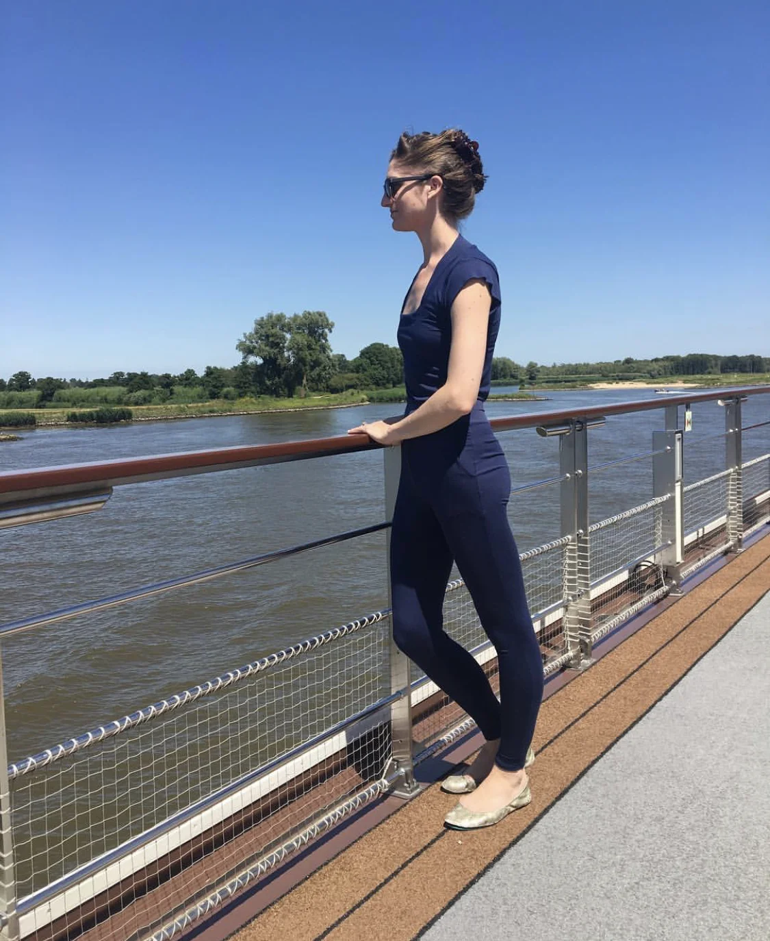 State of Bodhi Owner/Designer Emily Adams wearing the Finesse Jumpsuit