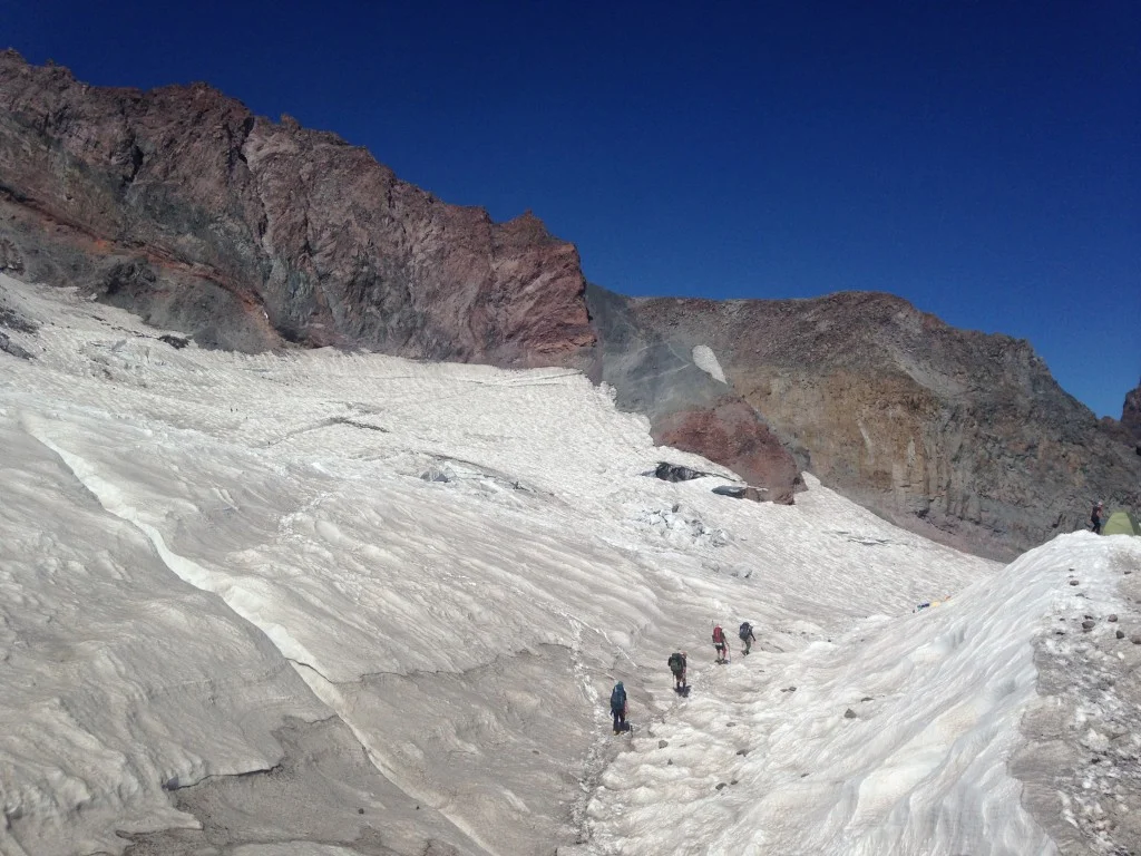 View of mountaineers beginning their summit attempt of Mt. Rainier, from Camp Muir. Photo: Chelsea Westerlund.