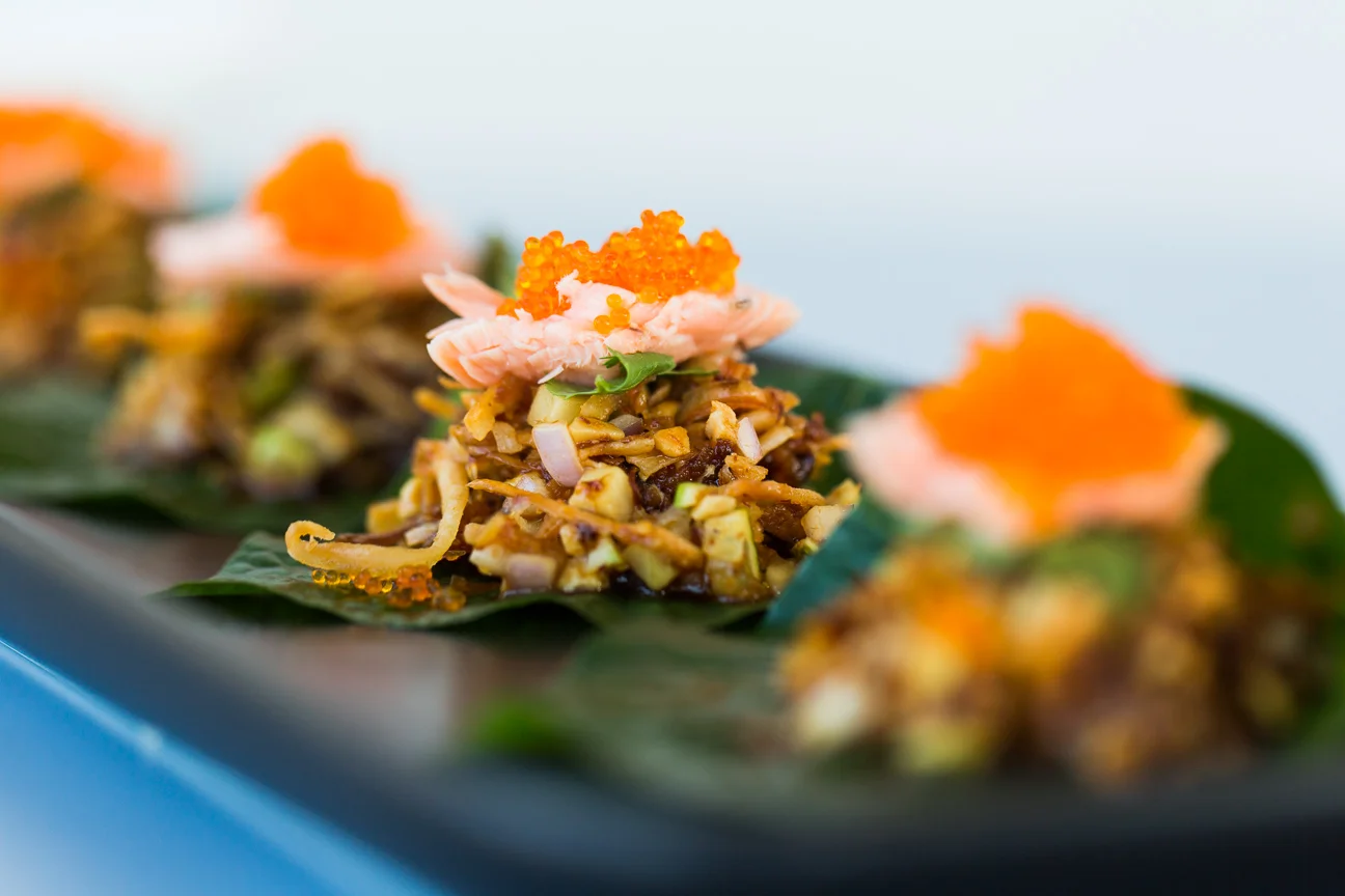 Betel Leaf with smoked trout, ginger, lime, roasted coconut and caramelized palm sugar