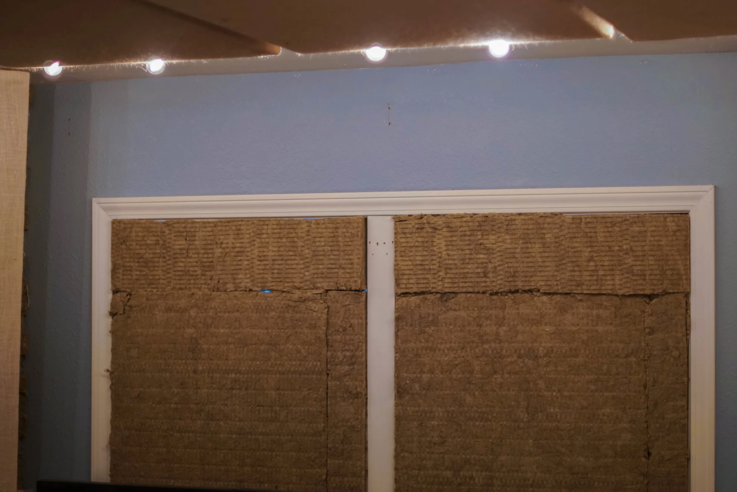 We started by filling the windows with two 2" rockwool panels.