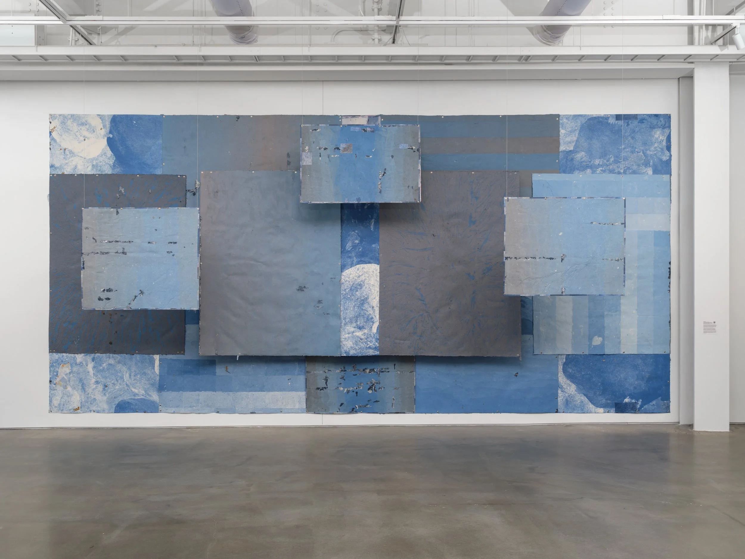    No Mother Tongue  . Materials: Hand-formed paper made with repurposed materials, poems, sun, ink, graphite, thread, hair, rust, rain, acrylic paint, archival prints, fallen foliage the wind carried to the frame, fallen foliage I found on many walk