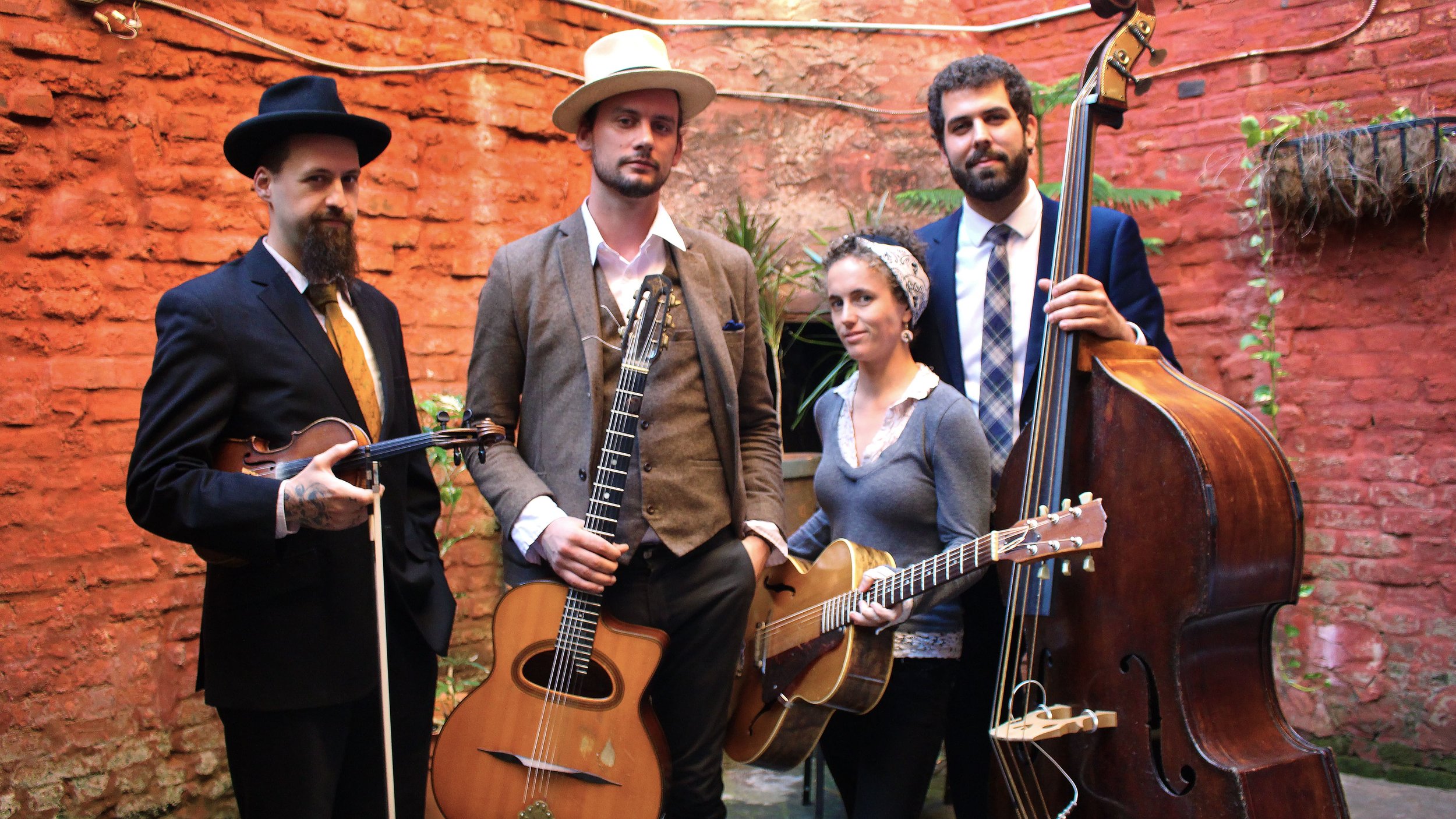 Showarama_Gypsy_Jazz_Magnolia_Entertainment_New_Orleans_NOLA_Music_Booking_Talent_Agency_guitar_Django_Reinhardt_Stephan_Grapelli_Russell_Welch