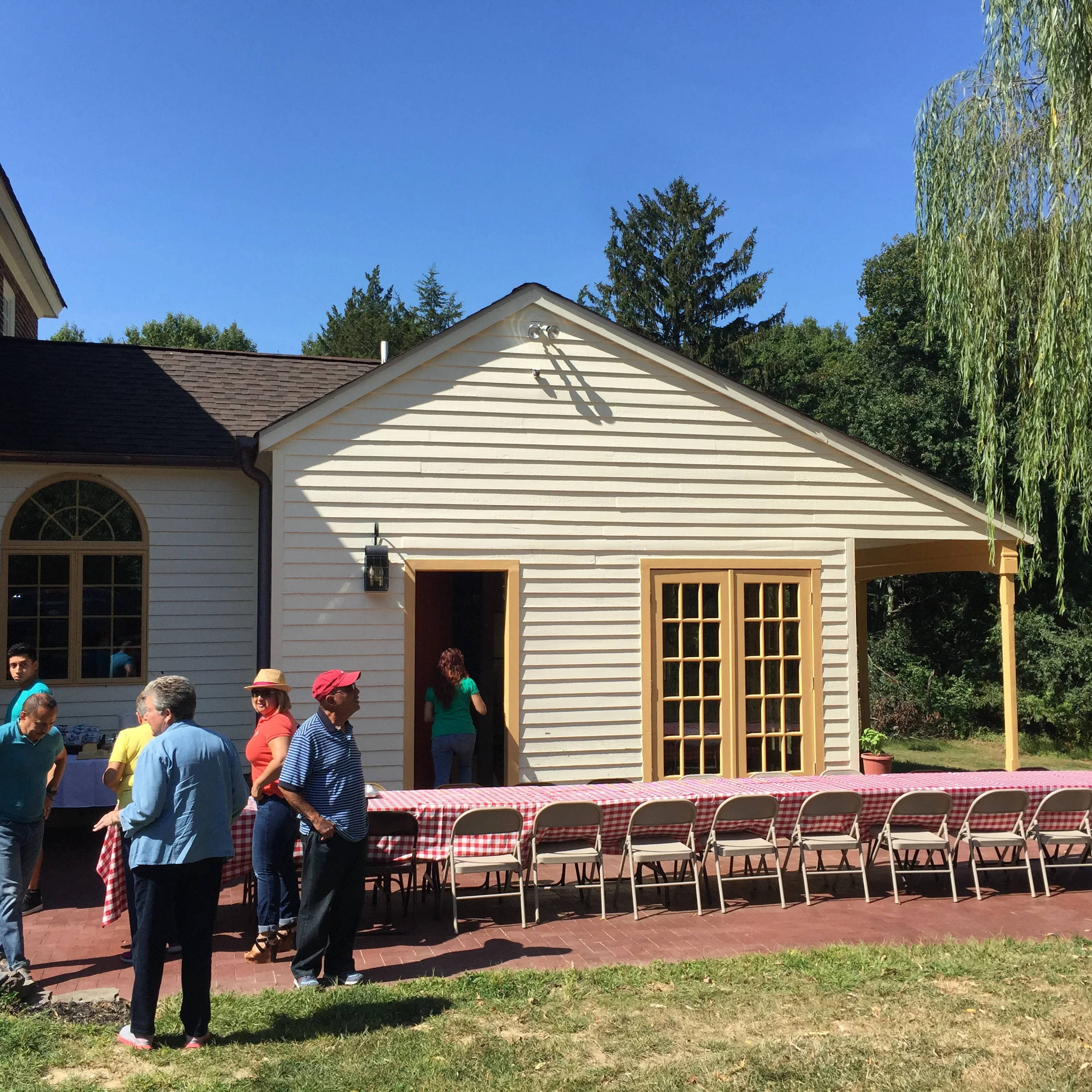  Table setup for a pig roast at Dickinson House 