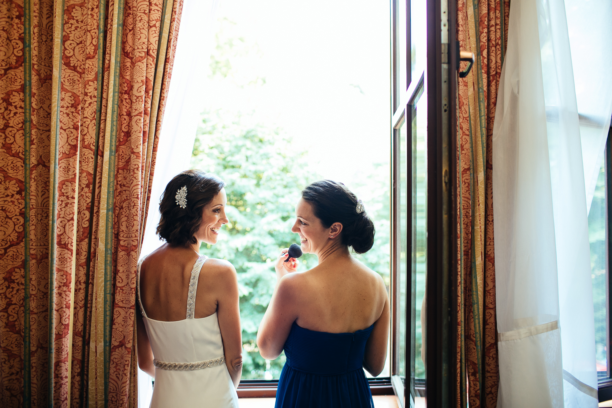 bride and sister emotional wedding photography