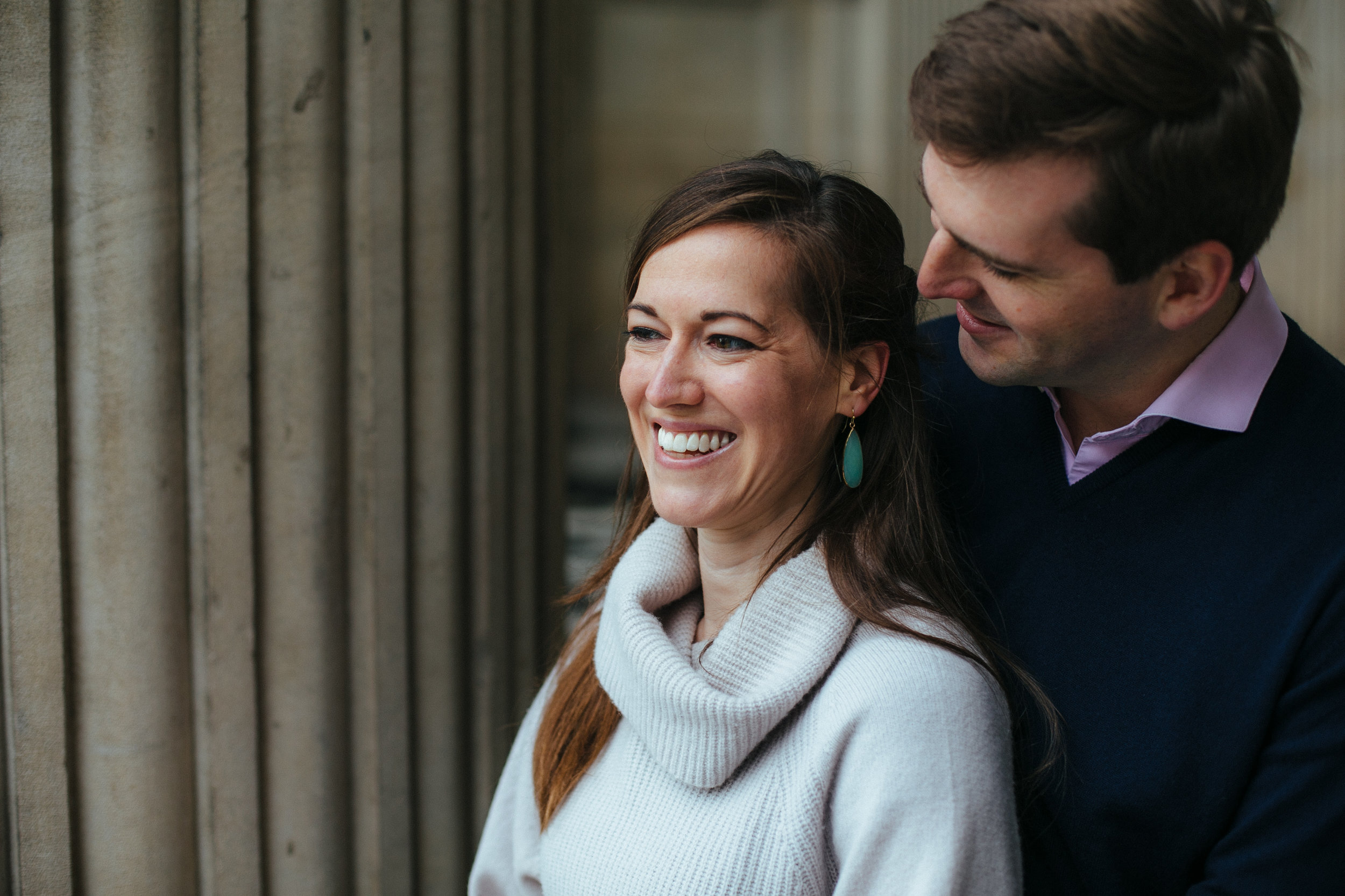 middle aged couple embracing on the steps of st Pauls in London