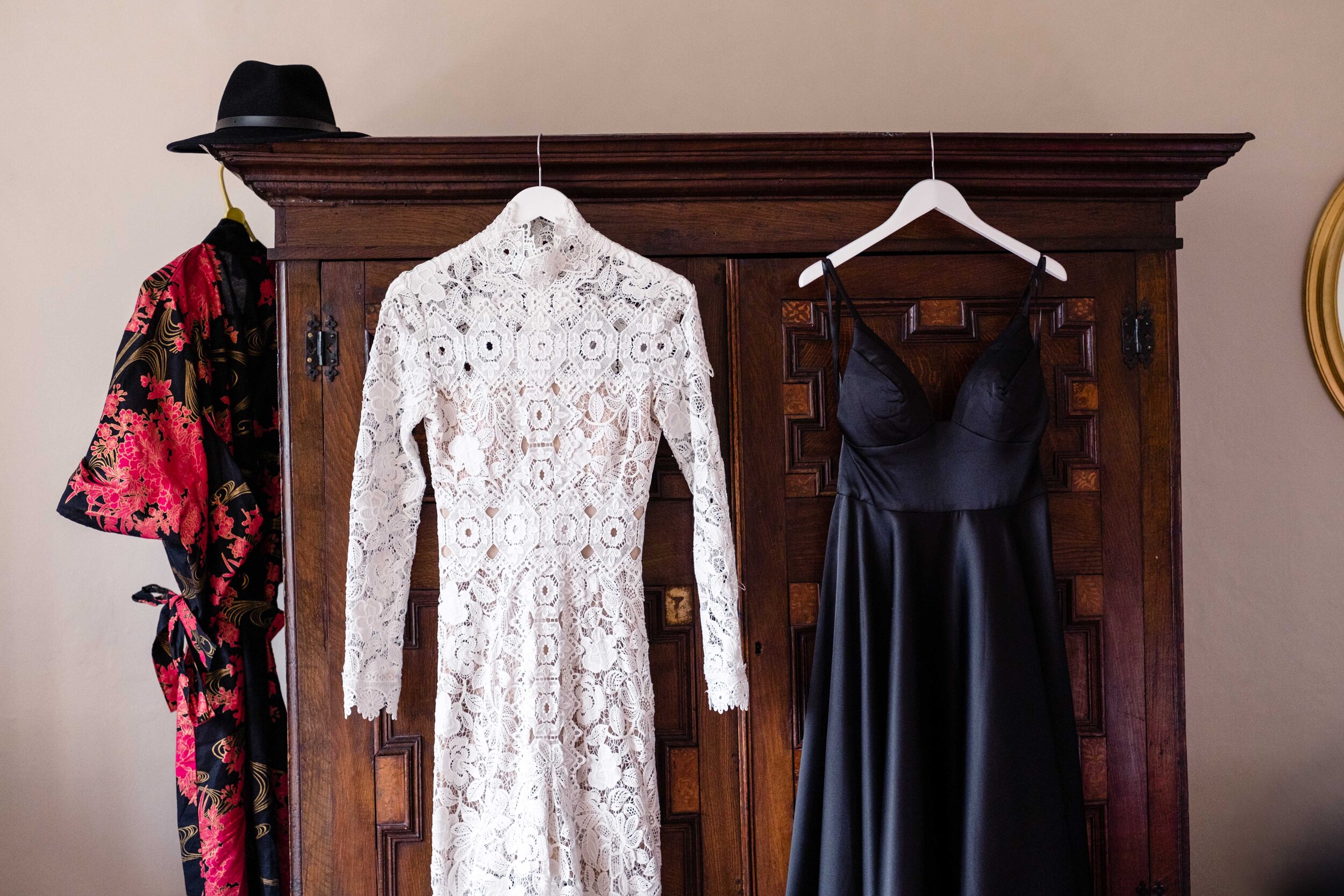 wedding dress hanging on a wardrobe