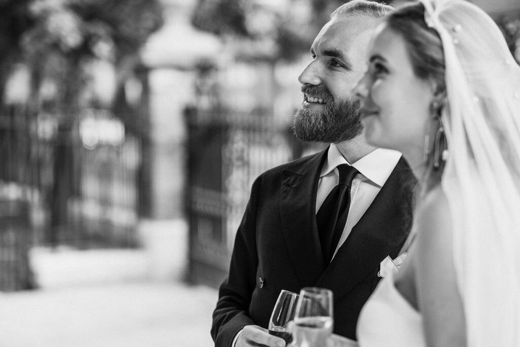 side angle of bride and groom black and white