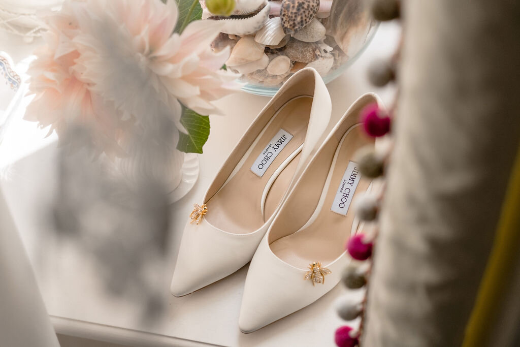 wedding shoes on a window sill