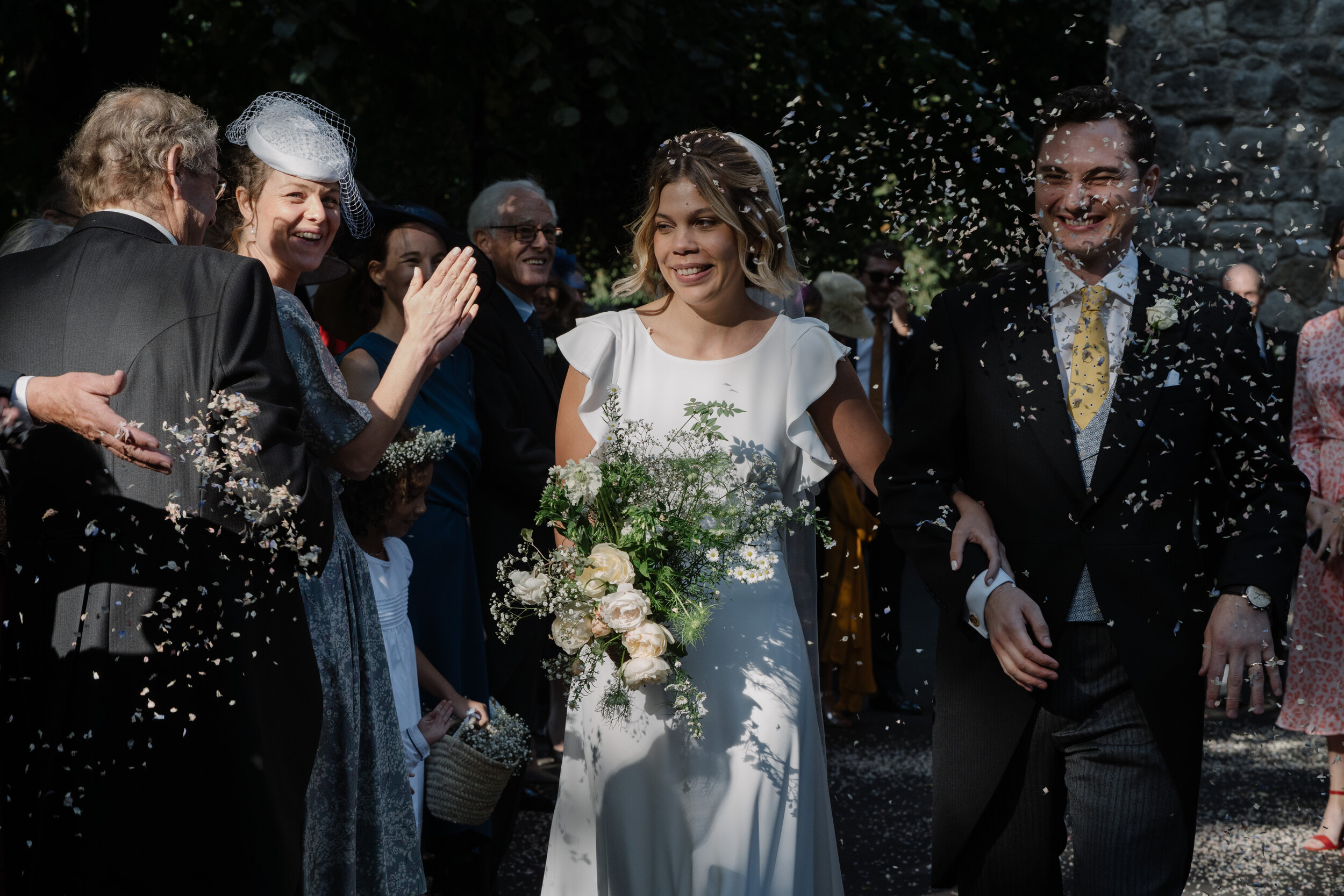 bride and groom confetti throw wedding photography Fulham Palace