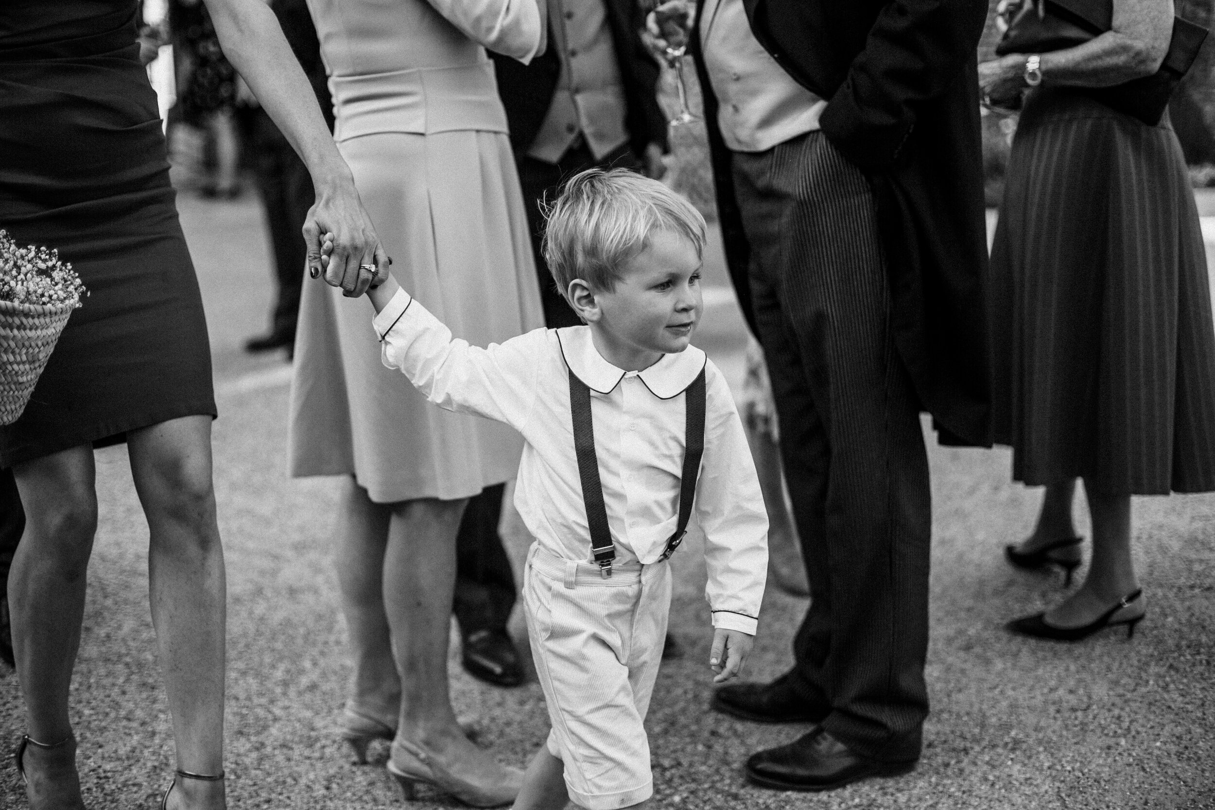 pageboy at wedding low shot black and white