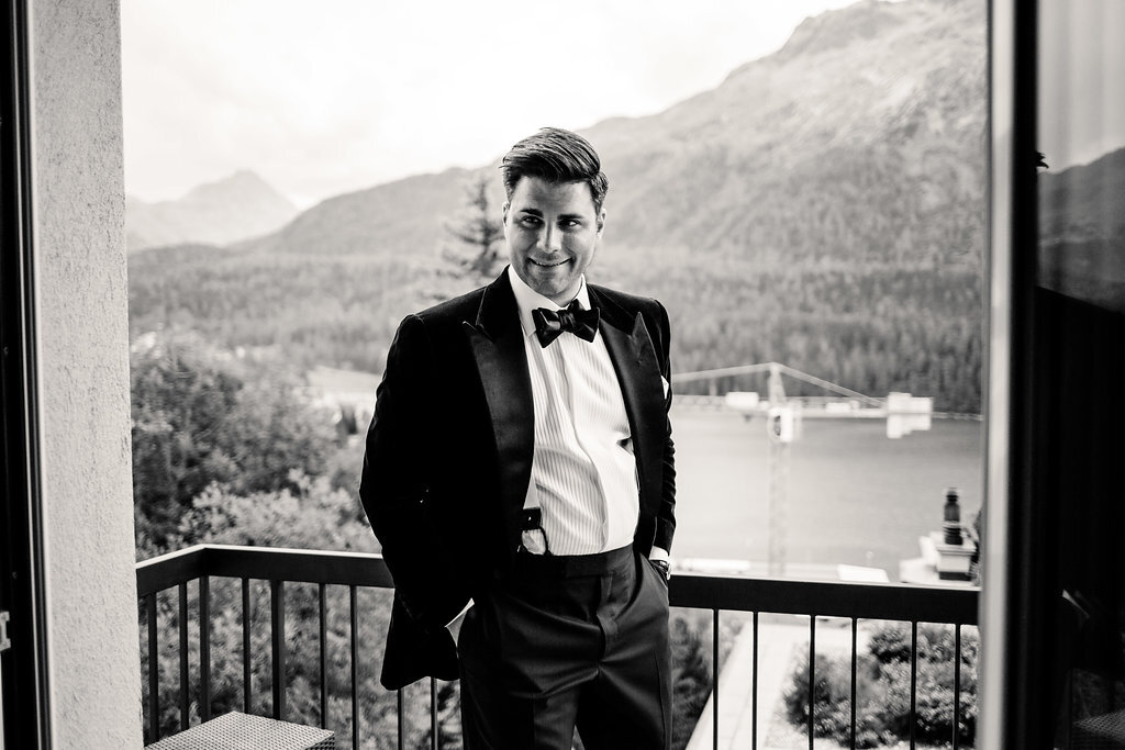 black and white groom at st moritz Kulm hotel