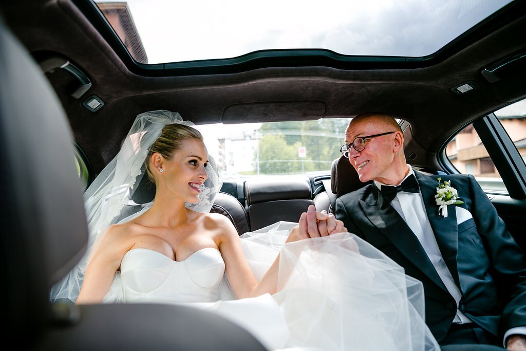 bride and father in back of car wedding photography st moritz