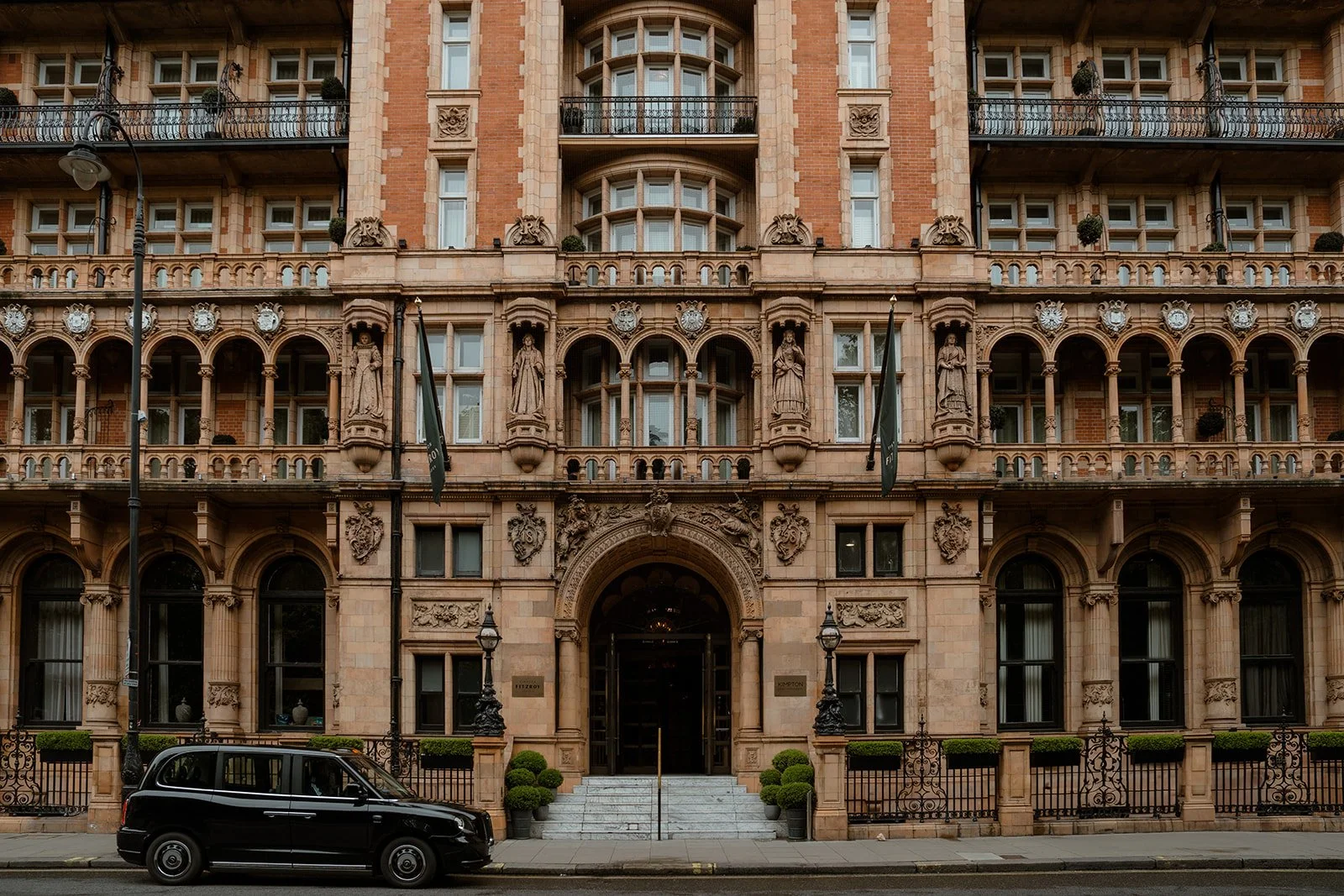 Exterior of the Kimpton Hotel, an ornate historic London building used as a wedding venue.