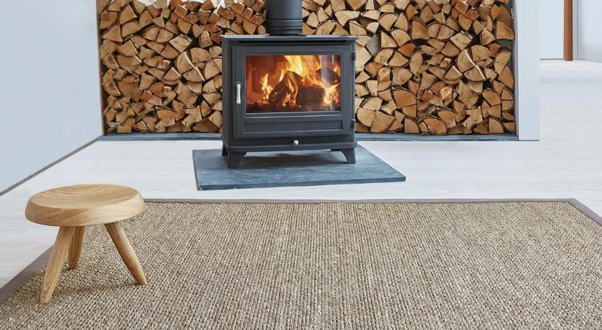 Sisal-Himalaya-Tibet-rug-in-front-of-Chesney-Fireplace-e1542032280993.jpg