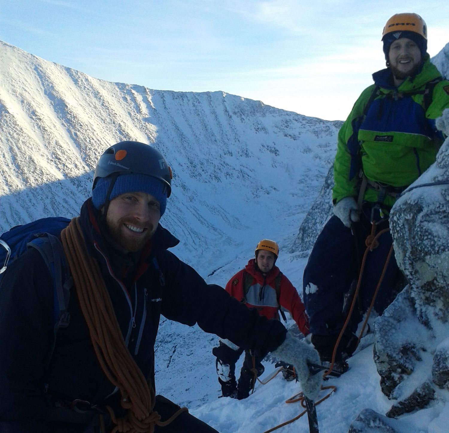 A group of winter mountaineers with coils of rope - Chris Ensoll Mountain Guide